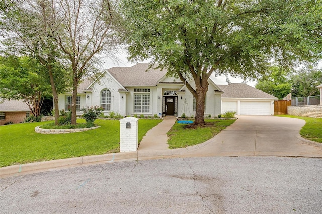 2006 Timber Cove Ct, Weatherford, TX 76087 - view of front facade featuring roof with shingles, a garage, and stucco siding