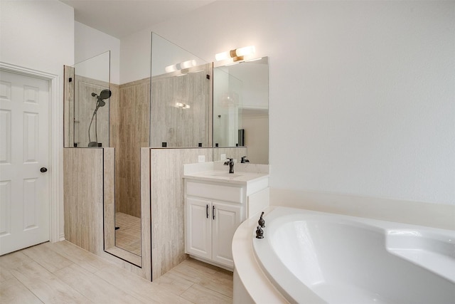 2006 Timber Cove Ct, Weatherford, TX 76087 - bathroom featuring a garden tub, walk in shower, and vanity