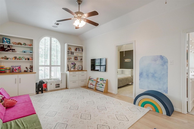 2006 Timber Cove Ct, Weatherford, TX 76087 - bedroom with vaulted ceiling, light wood finished floors, a ceiling fan, and baseboards