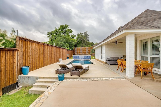 2006 Timber Cove Ct, Weatherford, TX 76087 - fenced backyard featuring a patio, a ceiling fan, and outdoor dining space