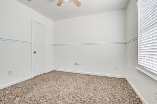 7130 Sorcey Rd, Dallas, TX 75249 - empty room featuring carpet floors, a ceiling fan, and baseboards
