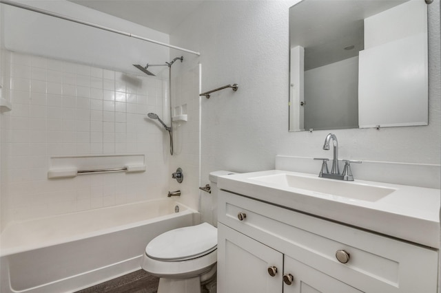 7130 Sorcey Rd, Dallas, TX 75249 - full bath with toilet, shower / bathtub combination, vanity, and wood finished floors