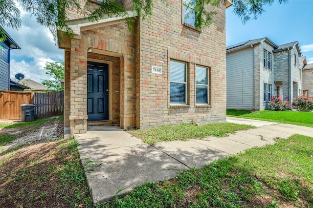 7130 Sorcey Rd, Dallas, TX 75249 - view of exterior entry featuring brick siding