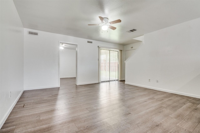 7130 Sorcey Rd, Dallas, TX 75249 - unfurnished room featuring ceiling fan, wood finished floors, and baseboards