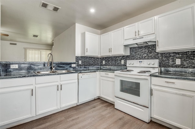 7130 Sorcey Rd, Dallas, TX 75249 - kitchen with white appliances, a sink, under cabinet range hood, light wood finished floors, and white cabinetry