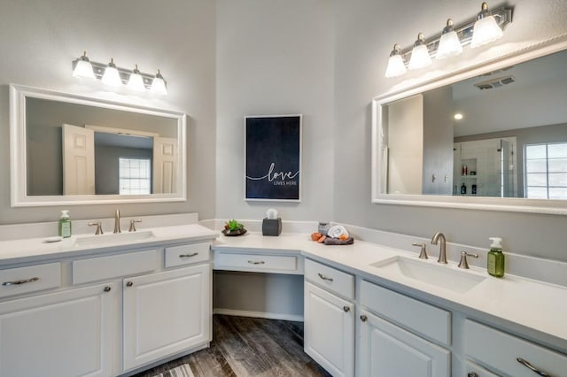 9807 Asheboro St, Frisco, TX 75035 - bathroom with vanity, wood finished floors, and a shower with shower door