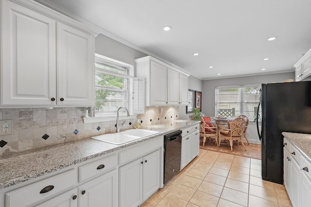 612 Twilight Trl, Richardson, TX 75080 - kitchen featuring black appliances, crown molding, white cabinetry, decorative backsplash, and light tile patterned flooring