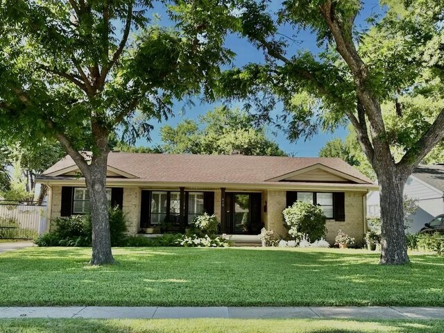 612 Twilight Trl, Richardson, TX 75080 - ranch-style house with brick siding and roof with shingles