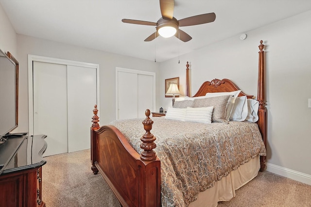 612 Twilight Trl, Richardson, TX 75080 - bedroom featuring two closets and ceiling fan