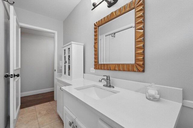 612 Twilight Trl, Richardson, TX 75080 - bathroom with vanity and tile patterned flooring