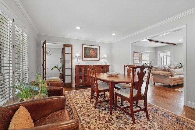 612 Twilight Trl, Richardson, TX 75080 - dining space with wood finished floors, ornamental molding, and recessed lighting