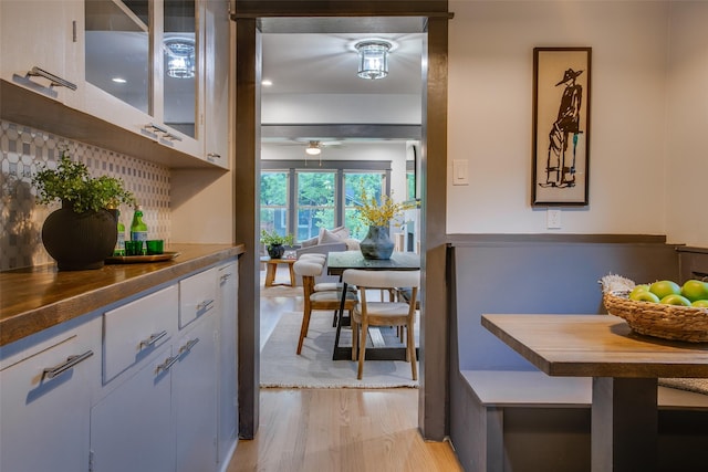 936 N Windomere Ave, Dallas, TX 75208 - dining space with light wood-style flooring and ceiling fan