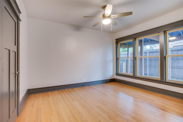 936 N Windomere Ave, Dallas, TX 75208 - spare room with light wood finished floors and ceiling fan