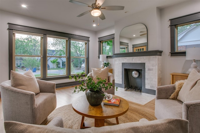 936 N Windomere Ave, Dallas, TX 75208 - living area featuring healthy amount of natural light, ceiling fan, wood finished floors, a brick fireplace, and recessed lighting