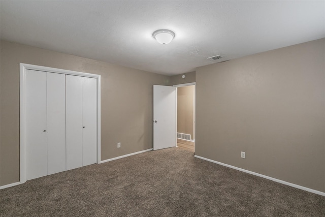 5113 S Drive, Fort Worth, TX 76132 - unfurnished bedroom with carpet, baseboards, and a closet