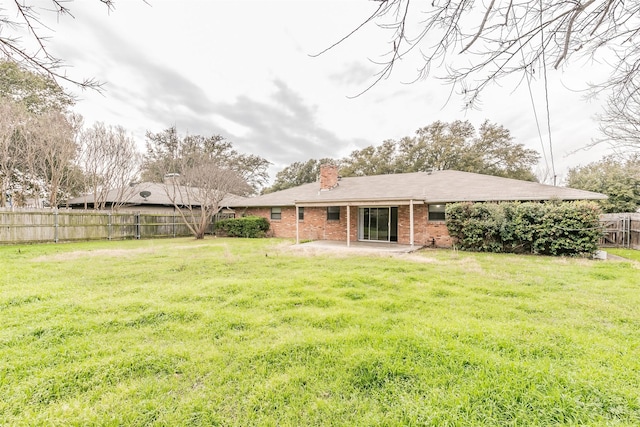 5113 S Drive, Fort Worth, TX 76132 - rear view of house with a patio, a chimney, and brick siding
