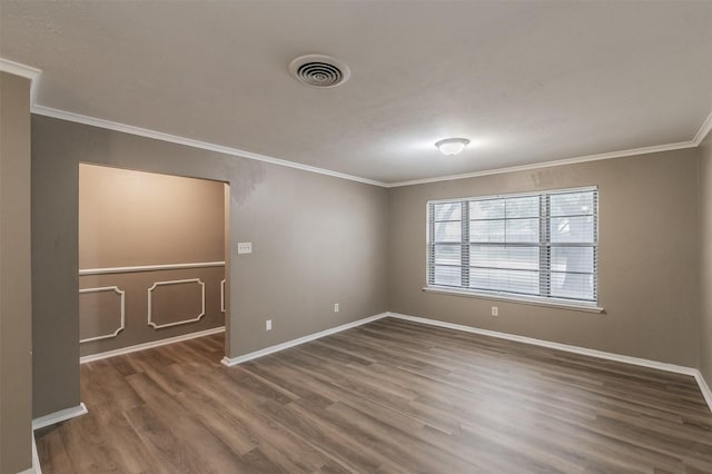 5113 S Drive, Fort Worth, TX 76132 - empty room with ornamental molding, wood finished floors, and baseboards