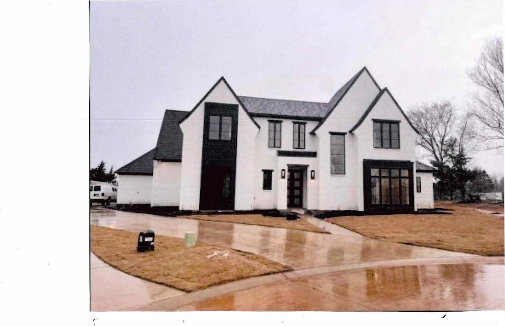 1128 Forest Trail Dr, Shreveport, LA 71106 - french provincial home featuring stucco siding