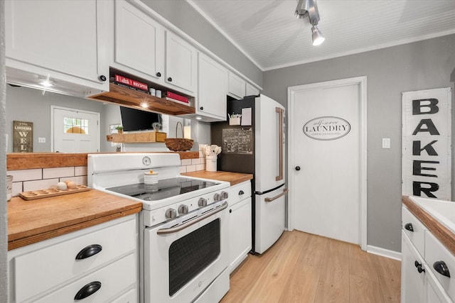 3809 Springtime Ct, Arlington, TX 76017 - kitchen featuring white appliances, light wood-style floors, white cabinetry, and wood counters
