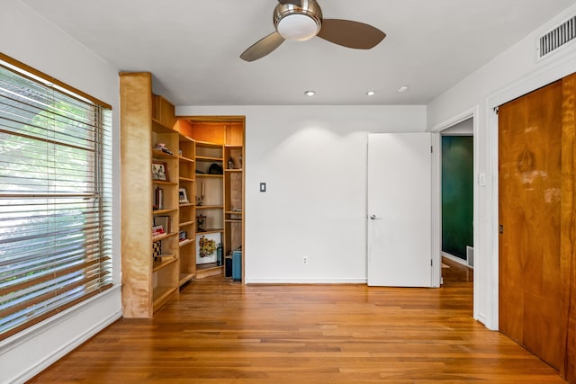 11616 Tuscany Way, Dallas, TX 75218 - spare room featuring ceiling fan, light wood-style floors, and recessed lighting