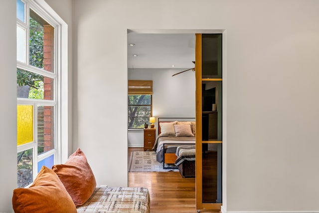 11616 Tuscany Way, Dallas, TX 75218 - bedroom with wood finished floors, multiple windows, and recessed lighting