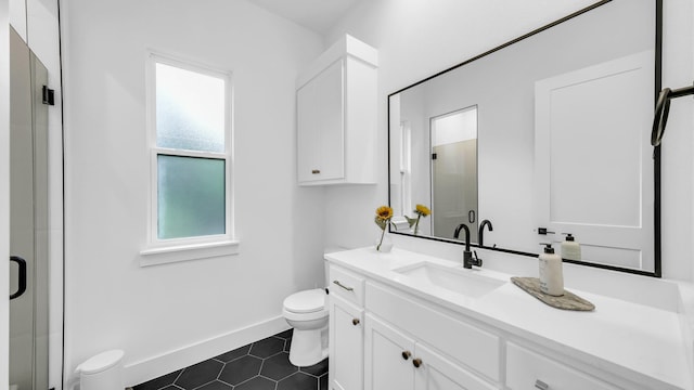 141 Lakeside Dr, Lipan, TX 76462 - bathroom with toilet, vanity, a shower stall, and tile patterned floors