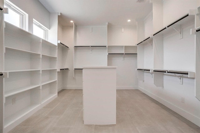 141 Lakeside Dr, Lipan, TX 76462 - spacious closet with light tile patterned floors