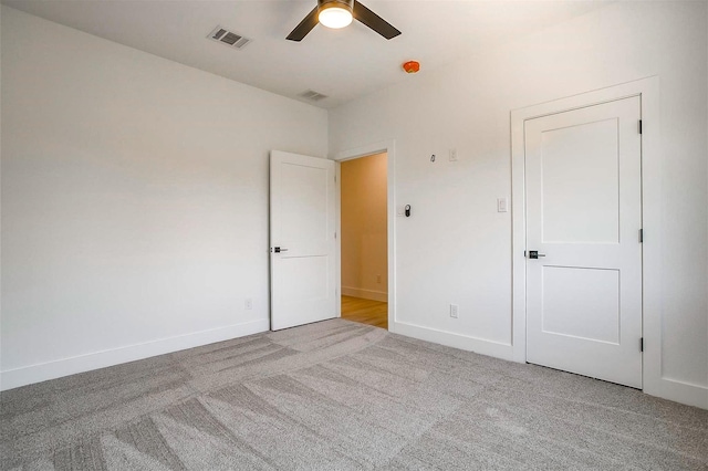 141 Lakeside Dr, Lipan, TX 76462 - unfurnished bedroom featuring carpet flooring, baseboards, and a ceiling fan