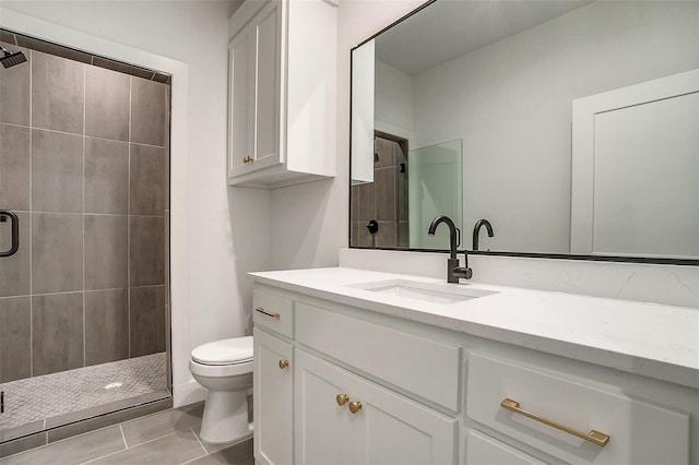 141 Lakeside Dr, Lipan, TX 76462 - bathroom featuring toilet, vanity, a shower stall, and tile patterned floors