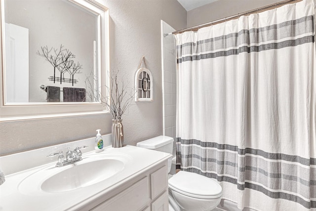 1200 Thornberry Dr, Mckinney, TX 75071 - bathroom with a textured wall, vanity, and a shower with shower curtain