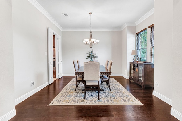 1200 Thornberry Dr, Mckinney, TX 75071 - dining space with hardwood / wood-style floors, a chandelier, crown molding, and baseboards