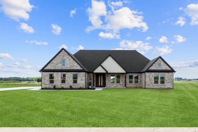1128 Dixie Estates Way, Whitesboro, TX 76273 - view of front of house with a front yard, brick siding, and a shingled roof