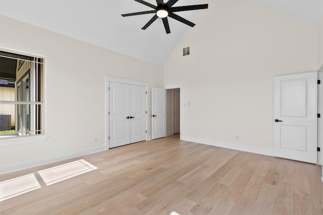 1128 Dixie Estates Way, Whitesboro, TX 76273 - empty room featuring high vaulted ceiling, a ceiling fan, light wood-type flooring, and baseboards