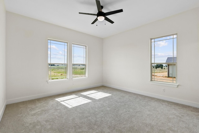 1128 Dixie Estates Way, Whitesboro, TX 76273 - unfurnished room with carpet, baseboards, and a ceiling fan