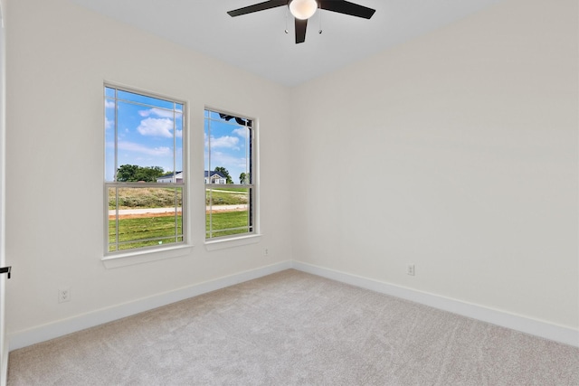 1128 Dixie Estates Way, Whitesboro, TX 76273 - empty room featuring carpet flooring, ceiling fan, and baseboards