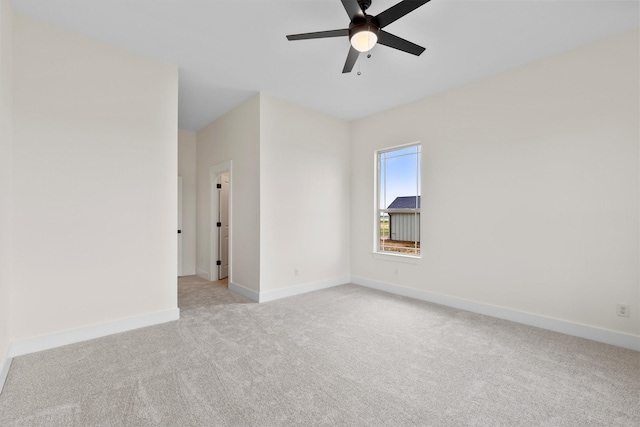 1128 Dixie Estates Way, Whitesboro, TX 76273 - spare room with light carpet, a ceiling fan, and baseboards