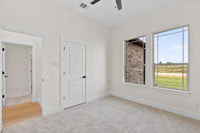 1128 Dixie Estates Way, Whitesboro, TX 76273 - unfurnished bedroom with carpet, baseboards, and ceiling fan