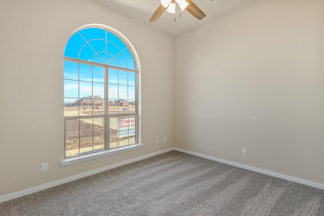 1022 Foolish Pleasure Dr, Terrell, TX 75160 - empty room featuring ceiling fan, carpet flooring, and baseboards