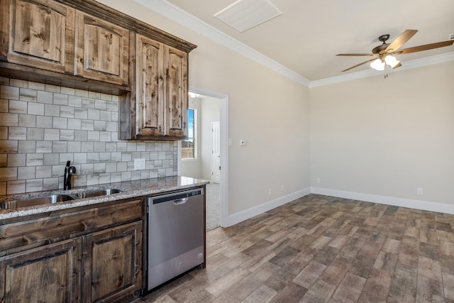 1022 Foolish Pleasure Dr, Terrell, TX 75160 - kitchen featuring dishwasher, a sink, a ceiling fan, dark wood finished floors, and crown molding