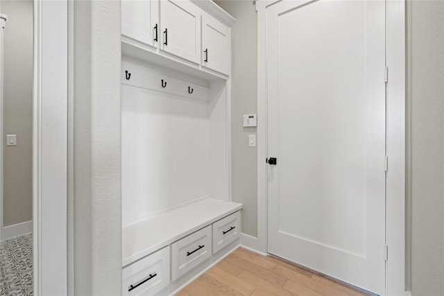 4665 Christie Ave, Caddo Mills, TX 75135 - mudroom featuring light wood finished floors and baseboards