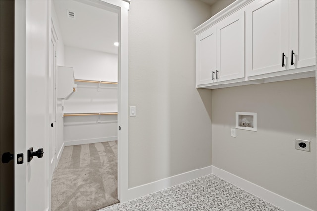 4665 Christie Ave, Caddo Mills, TX 75135 - laundry area featuring electric dryer hookup, cabinet space, baseboards, and washer hookup