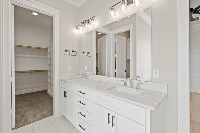 4665 Christie Ave, Caddo Mills, TX 75135 - full bath with double vanity, a walk in closet, marble look tiles, and baseboards