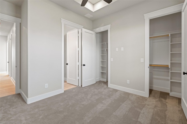 4665 Christie Ave, Caddo Mills, TX 75135 - unfurnished bedroom featuring carpet, baseboards, a closet, a spacious closet, and ceiling fan