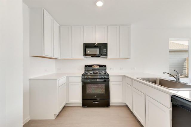 4900 Arden Springs Ave, Fort Worth, TX 76179 - kitchen featuring black appliances, a sink, white cabinets, and recessed lighting