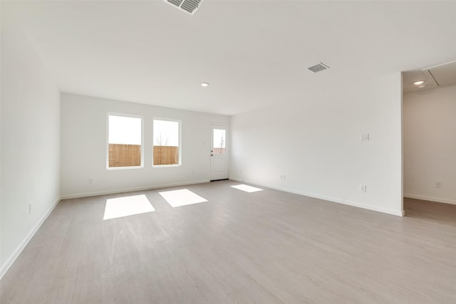 4900 Arden Springs Ave, Fort Worth, TX 76179 - unfurnished room with light wood finished floors, baseboards, recessed lighting, and attic access
