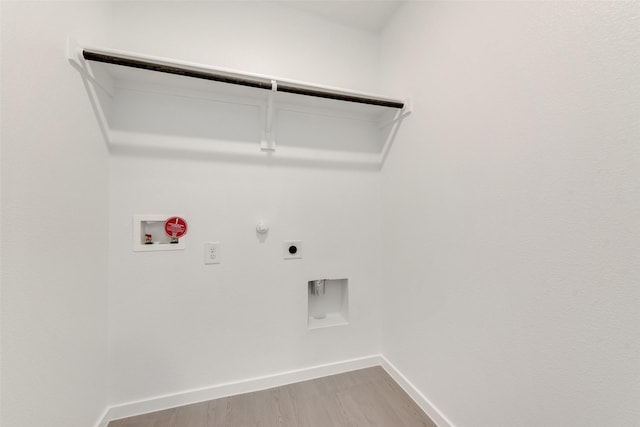 4900 Arden Springs Ave, Fort Worth, TX 76179 - washroom with gas dryer hookup, hookup for a washing machine, electric dryer hookup, light wood finished floors, and baseboards