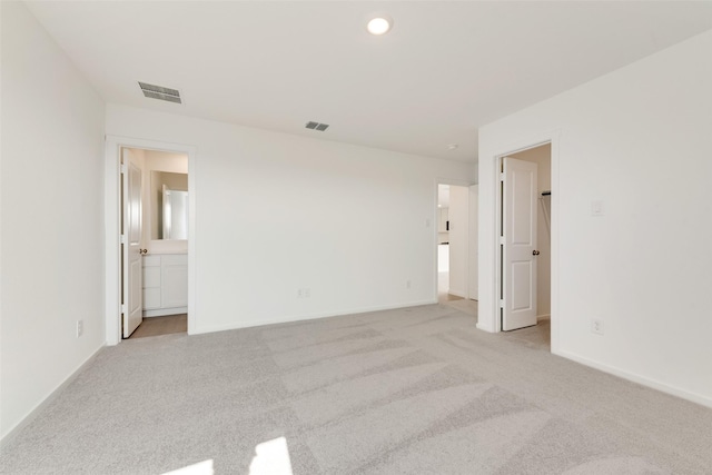 4900 Arden Springs Ave, Fort Worth, TX 76179 - unfurnished bedroom featuring light carpet, baseboards, and connected bathroom