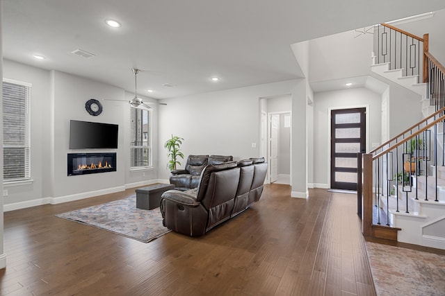 11415 Four Roses Trl, Frisco, TX 75035 - living room featuring a ceiling fan, stairs, dark wood-style floors, recessed lighting, and baseboards