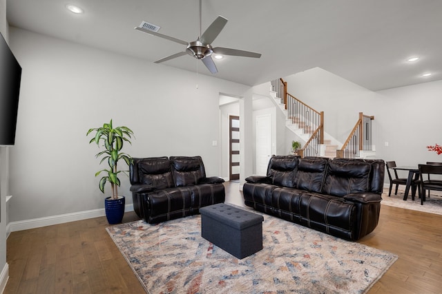 11415 Four Roses Trl, Frisco, TX 75035 - living area with stairway, ceiling fan, wood finished floors, recessed lighting, and baseboards