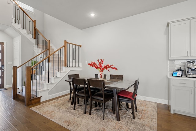 11415 Four Roses Trl, Frisco, TX 75035 - dining room featuring stairs, wood finished floors, baseboards, and recessed lighting